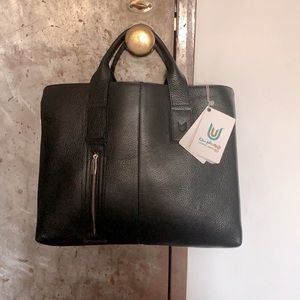 Metropolitan Pebble Navy Blue Leather Tote Bag.